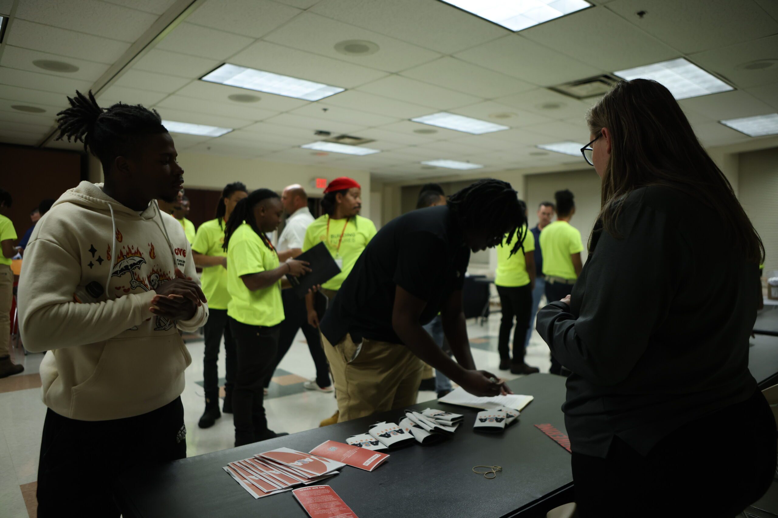 Group of construction workers gettting materials